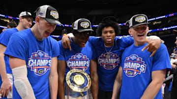 Mar 16, 2025; Nashville, TN, USA; The Florida Gators celebrate after defeating the Tennessee Volunteers in the 2025 SEC Championship Game at Bridgestone Arena. Mandatory Credit: Steve Roberts-Imagn Images