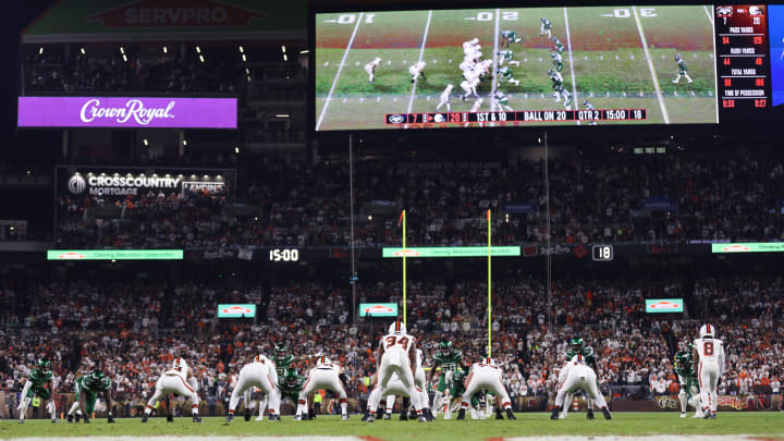 Dec 28, 2023; Cleveland, Ohio, USA; Cleveland Browns and New York Jets players await at the line of scrimmage pre snap during the first half at Cleveland Browns Stadium. Mandatory Credit: Scott Galvin-USA TODAY Sports