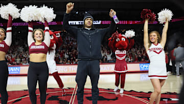 Mar 8, 2025; Fayetteville, Arkansas, USA; Arkansas Razorbacks commit Darius Acuff is introduced during a timeout in the first half against the Mississippi State Bulldogs at Bud Walton Arena.