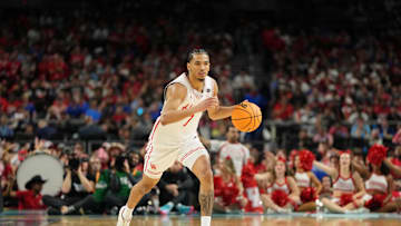 Apr 7, 2025; San Antonio, TX, USA; Houston Cougars guard Milos Uzan (7) dribbles the ball against the Florida Gators during the first half of the national championship game of the Final Four of the 2025 NCAA Tournament at the Alamodome. Mandatory Credit: Bob Donnan-Imagn Images