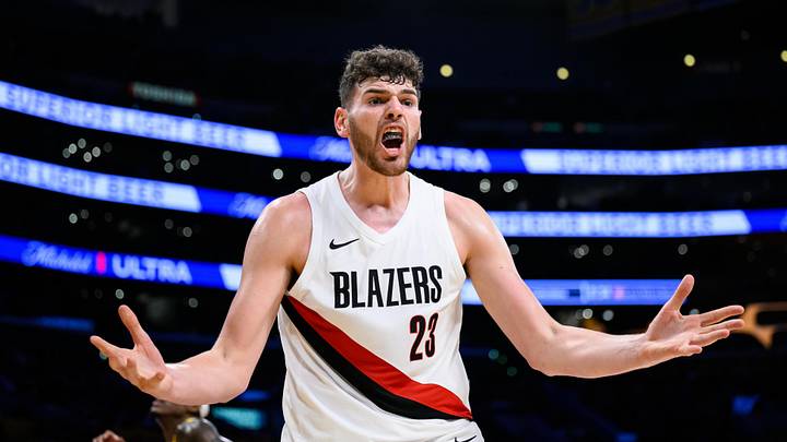 Oct 27, 2025; Los Angeles, California, USA; Portland Trail Blazers center Donovan Clingan (23) reacts during the first half against the Los Angeles Lakers at Crypto.com Arena. Mandatory Credit: William Liang-Imagn Images