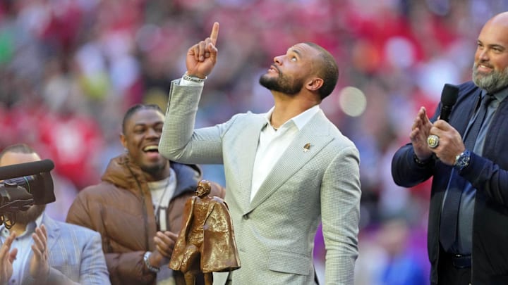 Dallas Cowboys QB Dak Prescott gestures before Super Bowl LVII between the Kansas City Chiefs and the Philadelphia Eagles. Dallas Cowboys QB Dak Prescott gestures before Super Bowl LVII between the Kansas City Chiefs and the Philadelphia Eagles.