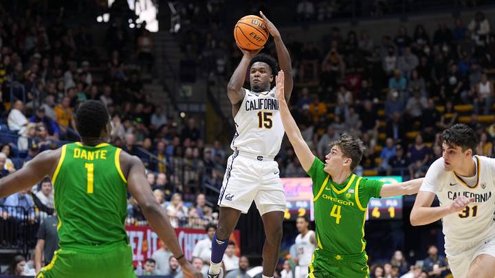 Feb 24, 2024; Berkeley, California; California Golden Bears guard Jalen Cone (15) shoots over Oregon Ducks forward Brennan Rigsby (4).