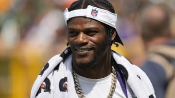 Aug 24, 2024; Green Bay, Wisconsin, USA;  Baltimore Ravens quarterback Lamar Jackson walks to the locker room prior to halftime of the game against the Green Bay Packers at Lambeau Field. Mandatory Credit: Jeff Hanisch-USA TODAY Sports