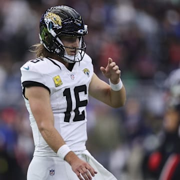 Nov 9, 2025; Houston, Texas, USA; Jacksonville Jaguars quarterback Trevor Lawrence (16) reacts after a play during the fourth quarter against the Houston Texans at NRG Stadium. Mandatory Credit: Troy Taormina-Imagn Images
