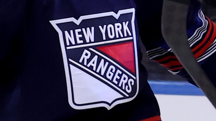 Jan 9, 2025; New York, New York, USA; New York Rangers center Sam Carrick (39) celebrates his game winning goal against the New Jersey Devils with right wing Reilly Smith (91) during overtime at Madison Square Garden.