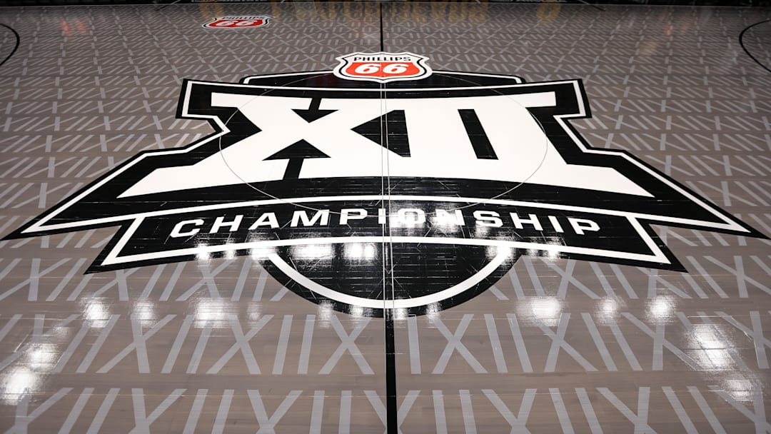 Mar 11, 2025; Kansas City, MO, USA; Big 12 logo center court prior to the game between the Cincinnati Bearcats and the Oklahoma State Cowboys at T-Mobile Center. Mandatory Credit: William Purnell-Imagn Images