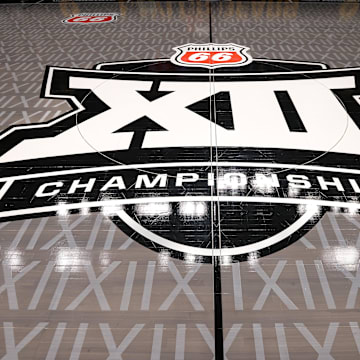Mar 11, 2025; Kansas City, MO, USA; Big 12 logo center court prior to the game between the Cincinnati Bearcats and the Oklahoma State Cowboys at T-Mobile Center. Mandatory Credit: William Purnell-Imagn Images