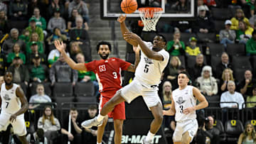 Feb 2, 2025; Eugene, Oregon, USA; Oregon Ducks guard TJ Bamba (5) intercepts a Nebraska pass during the first half at Matthew Knight Arena.