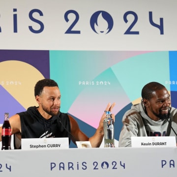 Jul 25, 2024; Paris, France; USA basketball players Stephen Curry and Kevin Durant talk to the media during a press conference. Mandatory Credit: Kirby Lee-USA TODAY Sports