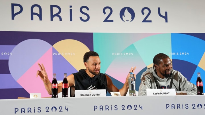 Jul 25, 2024; Paris, France; USA basketball players Stephen Curry and Kevin Durant talk to the media during a press conference. Mandatory Credit: Kirby Lee-USA TODAY Sports