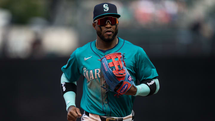 Jul 24, 2024; Seattle, Washington, USA;  Seattle Mariners centerfielder Victor Robles (10) jogs off the field during a game against the Los Angeles Angels at T-Mobile Park. Mandatory Credit: Stephen Brashear-USA TODAY Sports