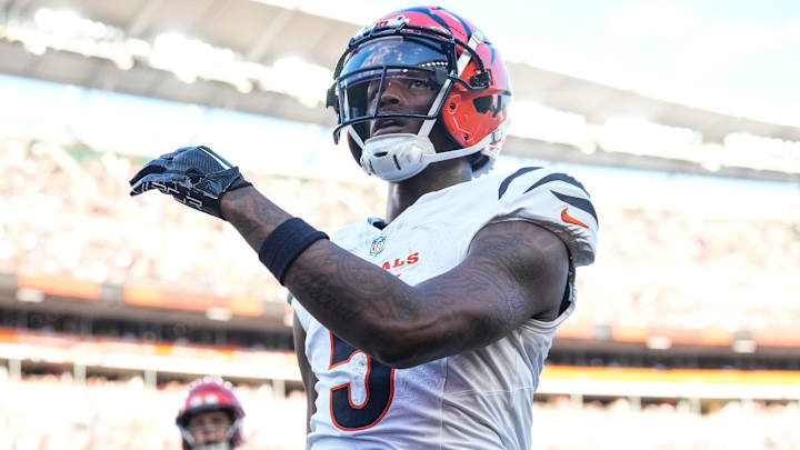 Cincinnati Bengals wide receiver Tee Higgins (5) runs through the end zone on a touchdown reception in the first quarter of the NFL Preseason Week 1 game between the Cincinnati Bengals and the Tampa Bay Buccaneers at Paycor Stadium in downtown Cincinnati on Saturday, Aug. 10, 2024.