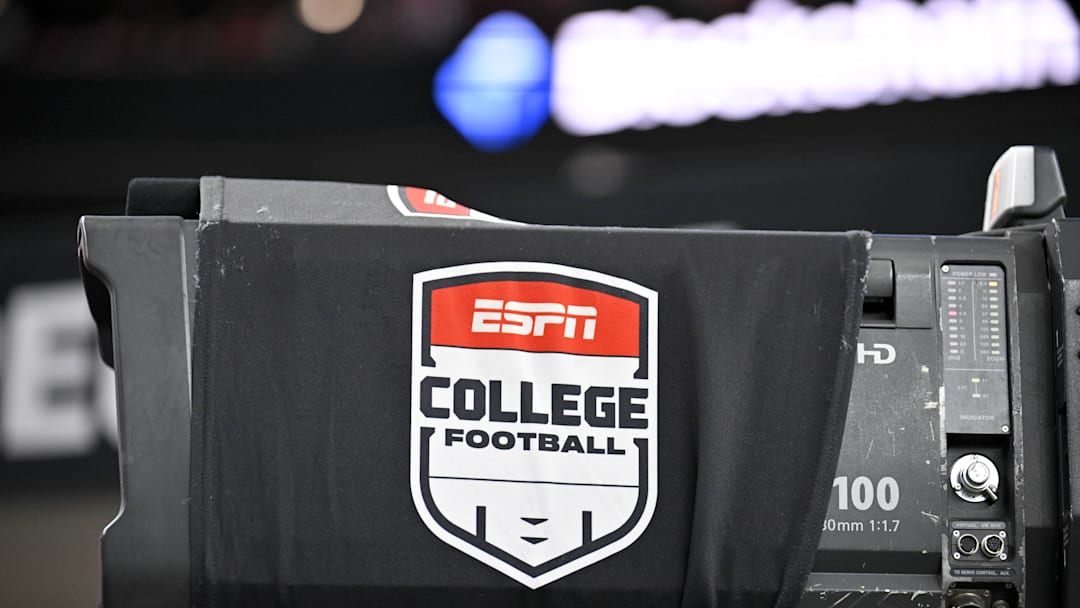 Dec 6, 2025; Arlington, TX, USA; A view of a tv camera and the ESPN college football logo before the game between the Texas Tech Red Raiders and the BYU Cougars at AT&T Stadium. Mandatory Credit: Jerome Miron-Imagn Images