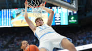 Nov 7, 2025; Chapel Hill, North Carolina, USA;  North Carolina Tar Heels center Henri Veesaar (13) scores in the second half at Dean E. Smith Center. Mandatory Credit: Bob Donnan-Imagn Images