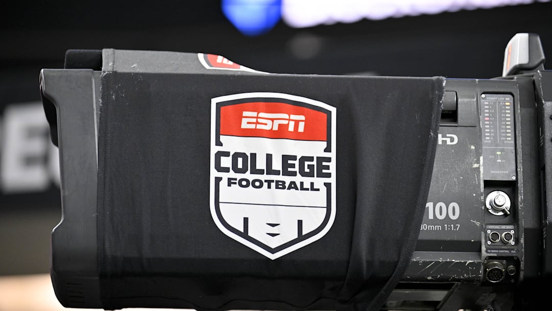 Dec 6, 2025; Arlington, TX, USA; A view of a tv camera and the ESPN college football logo before the game between the Texas Tech Red Raiders and the BYU Cougars at AT&T Stadium. Mandatory Credit: Jerome Miron-Imagn Images