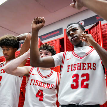 The Fishers Tigers huddle up Saturday, Dec. 14, 2024, after an Indiana High School Basketball FORUM Tipoff Classic game between Fishers and Crispus Attucks at Southport Fieldhouse in Indianapolis.