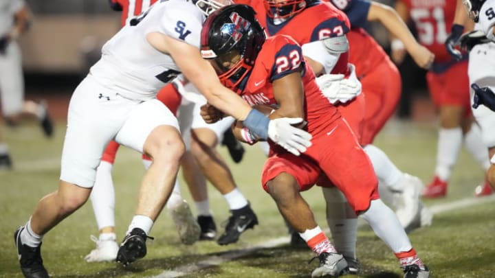 Brownsville Veterans Memorial fullback Alvin Trevillion rushes against Smithson Valley during the 5A Division I state semifinals.