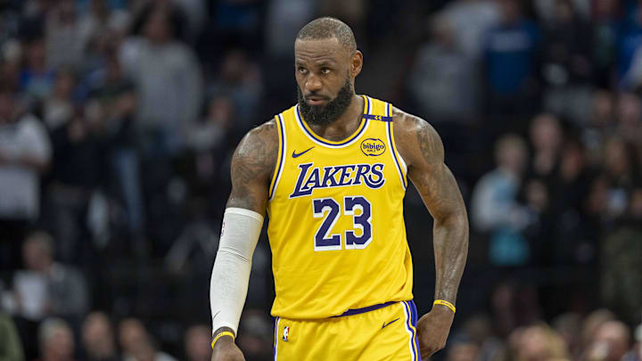 Los Angeles Lakers forward LeBron James looks on against the Minnesota Timberwolves. Los Angeles Lakers forward LeBron James looks on against the Minnesota Timberwolves.