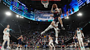 Feb 12, 2025; Inglewood, California, USA; LA Clippers guard Amir Coffey (7) shoots against Memphis Grizzlies forward Jaren Jackson Jr. (13) in the second half at Intuit Dome.