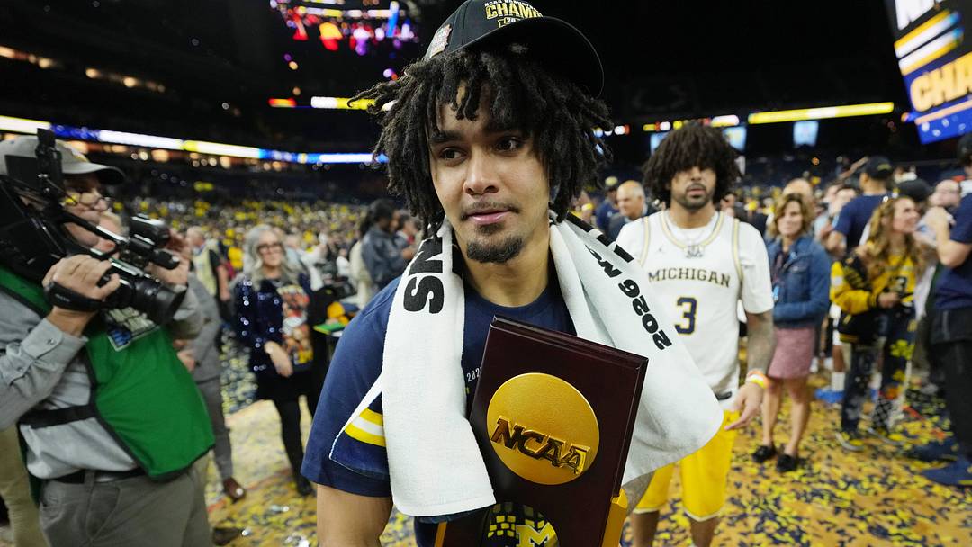 Apr 6, 2026; Indianapolis, IN, USA; Michigan Wolverines guard Elliot Cadeau (3) celebrates after their win against the UConn Huskies in the national championship of the Final Four of the men's 2026 NCAA Tournament between the and the Michigan Wolverines at Lucas Oil Stadium. Mandatory Credit: Bob Donnan-Imagn Images Apr 6, 2026; Indianapolis, IN, USA; Michigan Wolverines guard Elliot Cadeau (3) celebrates after their win against the UConn Huskies in the national championship of the Final Four of the men's 2026 NCAA Tournament between the and the Michigan Wolverines at Lucas Oil Stadium. Mandatory Credit: Bob Donnan-Imagn Images
