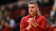 Jan 22, 2025; Stanford, California, USA; Stanford Cardinal head coach Kyle Smith claps against the Miami (FL) Hurricanes in the second half at Maples Pavilion. Mandatory Credit: Eakin Howard-Imagn Images