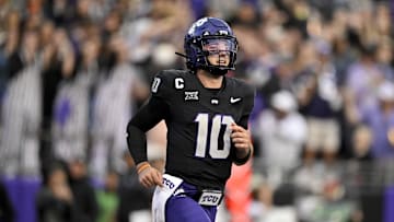 Nov 29, 2025; Fort Worth, Texas, USA; TCU Horned Frogs quarterback Josh Hoover (10) runs off the field after throwing for a touchdown against the Cincinnati Bearcats during the first half at Amon G. Carter Stadium. Mandatory Credit: Jerome Miron-Imagn Images