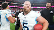 Oct 5, 2025; Glendale, Arizona, USA; Tennessee Titans kicker Joey Slye (6) holds a game ball after his 29-yard field goal won the game against the Arizona Cardinals during the fourth quarter at State Farm Stadium. Mandatory Credit: Joe Camporeale-Imagn Images