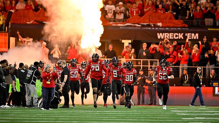 Dec 6, 2025; Arlington, TX, USA; The Texas Tech Red Raiders take the field to face the BYU Cougars at AT&T Stadium. Mandatory Credit: Jerome Miron-Imagn Images