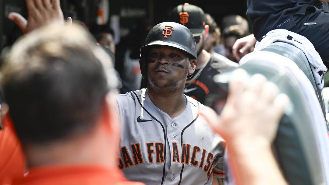 Jun 6, 2026; Chicago, Illinois, USA;  San Francisco Giants first baseman Rafael Devers (16) celebrates in the dugout after hitting a home run during the sixth inning against the Chicago Cubs at Wrigley Field. Mandatory Credit: Matt Marton-Imagn Images