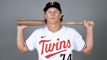 Feb 21, 2025; Fort Myers, FL, USA;  Minnesota Twins first infielder Luke Keaschall (74) takes photos during media day.  Mandatory Credit: Chris Tilley-Imagn Images