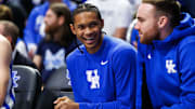 Oct 24, 2025; Lexington, KY, USA; Kentucky Wildcats guard Jaland Lowe (left) talks with guard Walker Horn (right) on the bench during the second half against the Purdue Boilermakers at Rupp Arena at Central Bank Center. Mandatory Credit: Jordan Prather-Imagn Images