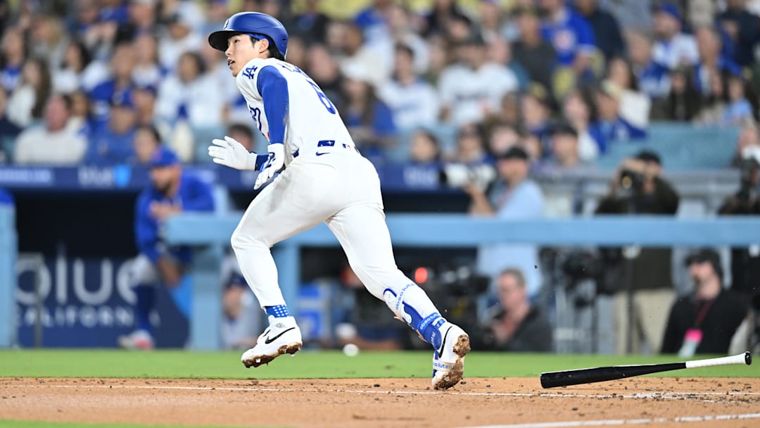 Apr 24, 2026; Los Angeles, California, USA;  Los Angeles Dodgers second baseman Hyeseong Kim (6) hits an RBI single during the fourth inning against the Chicago Cubs at Dodger Stadium. Mandatory Credit: William Liang-Imagn Images