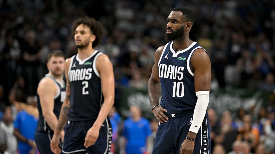 May 13, 2024; Dallas, Texas, USA; Dallas Mavericks guard Luka Doncic (77) and center Dereck Lively II (2) and forward Tim Hardaway Jr. (10) look on during the second half against the Oklahoma City Thunder in game four of the second round for the 2024 NBA playoffs at American Airlines Center. Mandatory Credit: Jerome Miron-USA TODAY Sports