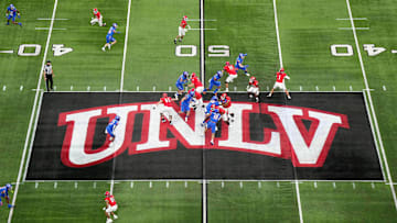 A general overall view as UNLV Rebels quarterback Jayden Maiava (1) throws the ball on the UNLV logo at midfield against the Boise State Broncos in the first half during the Mountain West Championship at Allegiant Stadium. 