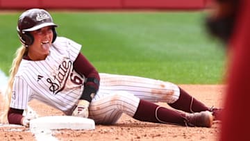 Mississippi State's Kylee Edwards celebrates after successfully stealing second base in Sunday's series finale against No. 2 Oklahoma. 