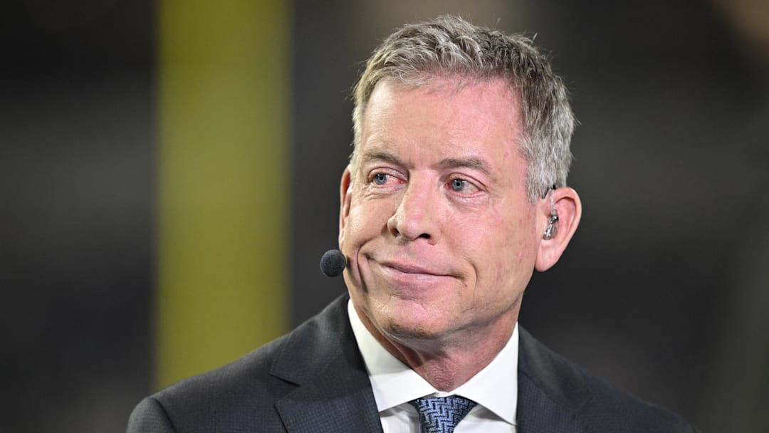 Television commentator Troy Aikman speaks before the game between the Dallas Cowboys and the Arizona Cardinals at AT&;T Stadium.