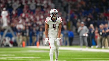 Dec 28, 2023; San Antonio, TX, USA;  Arizona Wildcats wide receiver Tetairoa McMillan (4) gets ready for a play in the first half against the Oklahoma Sooners at Alamodome. Mandatory Credit: Daniel Dunn-USA TODAY Sports