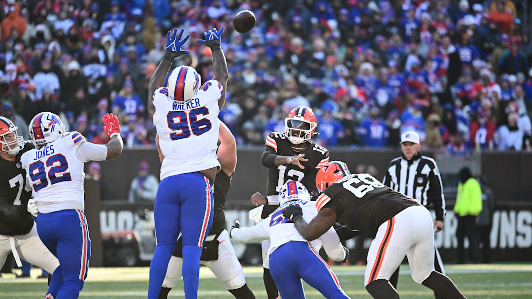 Cleveland Browns quarterback Shedeur Sanders throws the ball as Buffalo Bills defensive tackle Deone Walker bats the ball down during the second half at Huntington Bank Field.