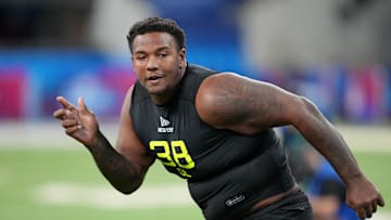 Kentucky defensive lineman Deone Walker participates in drills during the NFL Combine at Lucas Oil Stadium.