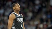 Mar 9, 2025; Minneapolis, Minnesota, USA; San Antonio Spurs guard De'Aaron Fox (4) looks on against the Minnesota Timberwolves in the second half at Target Center. Mandatory Credit: Jesse Johnson-Imagn Images