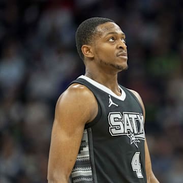 Mar 9, 2025; Minneapolis, Minnesota, USA; San Antonio Spurs guard De'Aaron Fox (4) looks on against the Minnesota Timberwolves in the second half at Target Center. Mandatory Credit: Jesse Johnson-Imagn Images