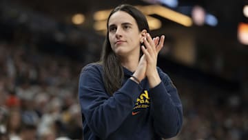 Indiana Fever guard Caitlin Clark (22) looks on against the Minnesota Lynx in the second half during the Commissioner's Cup final at Target Center.