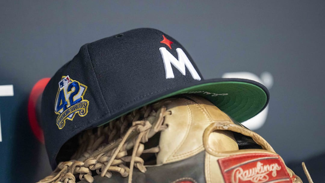 Apr 15, 2025; Minneapolis, Minnesota, USA; A general view of a Minnesota Twins hat with a Jackie Robinson logo stitched on the side of it against the New York Mets in the fourth inning at Target Field. All players wore #42 for Jackie Robinson Day Mandatory Credit: Jesse Johnson-Imagn Images