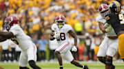 Oct 11, 2025; Columbia, Missouri, USA; Alabama Crimson Tide running back Kevin Riley (28) runs the ball against the Missouri Tigers during the first half of the game at Faurot Field at Memorial Stadium. Mandatory Credit: Jay Biggerstaff-Imagn Images