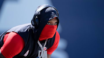 Sep 14, 2024; Logan, Utah, USA;  Utah Utes cornerback Cameron Calhoun (4) warms up before a game against the Utah State Aggies at Merlin Olsen Field at Maverik Stadium. Mandatory Credit: Jamie Sabau-Imagn Images