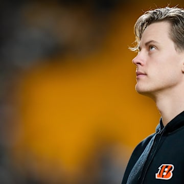 Injured Cincinnati Bengals quarterback Joe Burrow (9) heads to the locker room after the fourth quarter of the NFL 16 game between the Pittsburgh Steelers and the Cincinnati Bengals at Acrisure Stadium in Pittsburgh on Saturday, Dec. 23, 2023. The Steelers won 34-11.