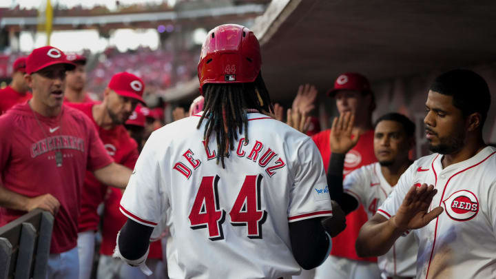 Cincinnati Reds shortstop Elly De La Cruz (44) returns to the dugout after scoring in the fourth inning of the MLB National League game between the Cincinnati Reds and the Pittsburgh Pirates at Great American Ball Park on Monday, June 24, 2024.