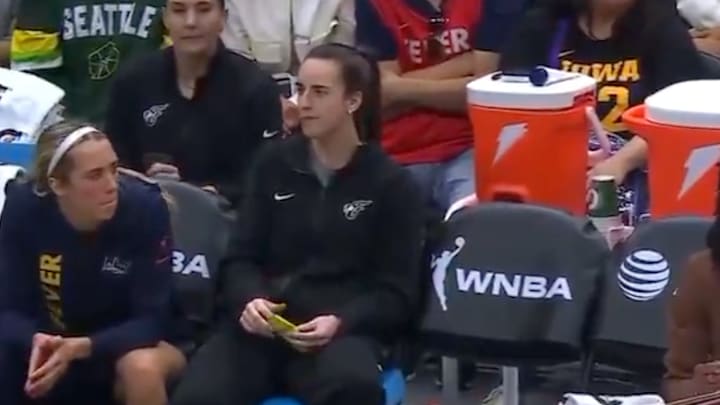 Caitlin Clark was seen having a little snack during the Fever's win over the Storm on Sunday. 