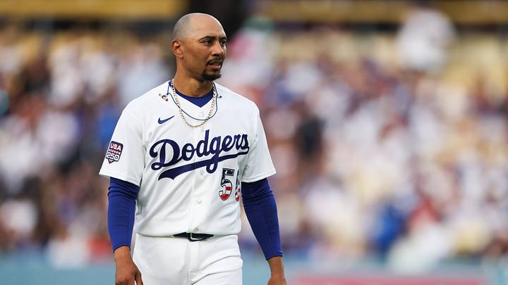 Jul 4, 2026; Los Angeles, California, USA; Los Angeles Dodgers shortstop Mookie Betts (50) looks on in the first inning against the San Diego Padres at Dodger Stadium. Mandatory Credit: Kiyoshi Mio-Imagn Images
